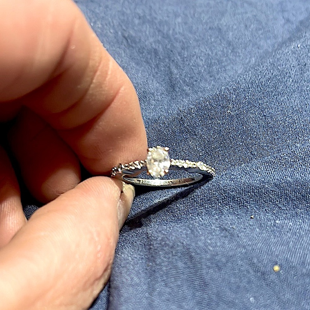 Custom engagement ring 1/2 crt center and 1/2 on sides